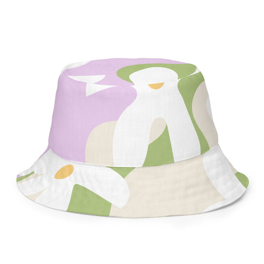 "Petal Dance" Bucket Hat – a stylish accessory to elevate your summer look. Designed with the exclusive hand-drawn white flower pattern inspired by Finnish fields, this bucket hat brings a touch of nature to your outfit. Print N Stuff Turku Finland