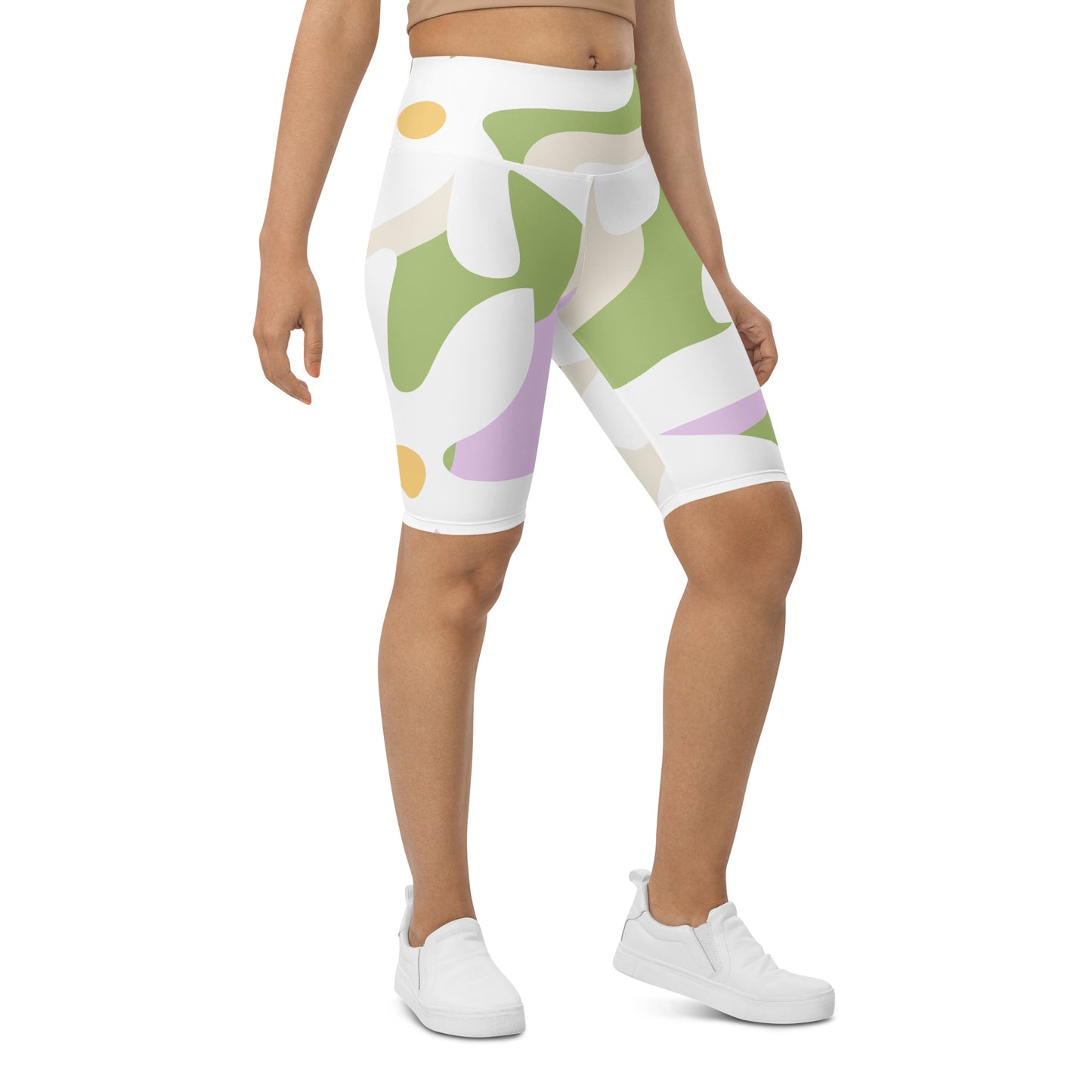 "Petal Dance" Biker Shorts – the perfect blend of style and functionality. Adorned with a trendy white flower pattern inspired by Finnish landscapes, these shorts add a touch of nature to your workout routine.  Print N Stuff
