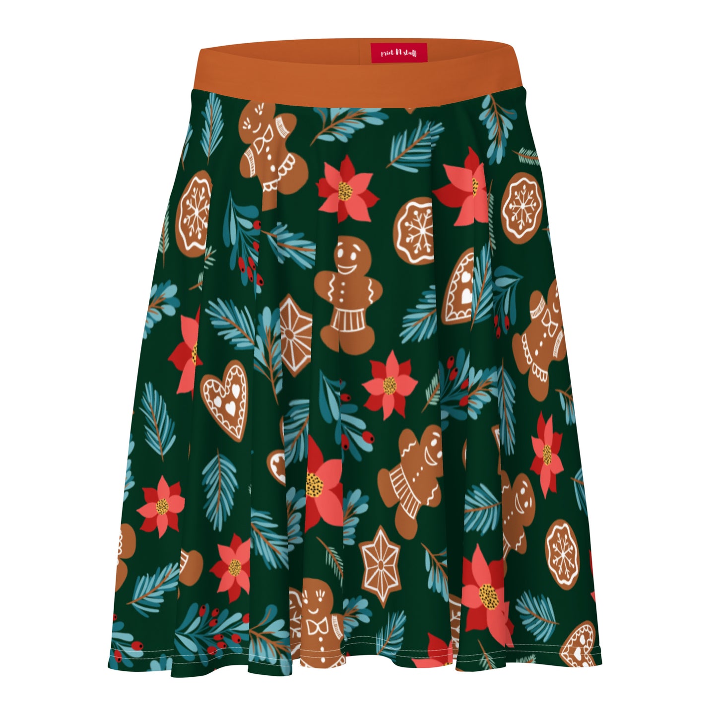 English Alt Text: "Fantasiapiparit / Gingerbread Fantasy Skirt - Charming with a Touch of Christmas - Designed in Turku, Finland by Print N Stuff." Finnish Alt Text: "Fantasiapiparit / Gingerbread Fantasy Hame - Viehättävä jouluinen valinta - Suunniteltu Turussa, Suomessa Print N Stuffin toimesta.